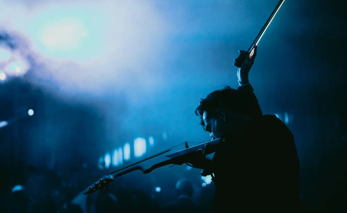 Violinist Mike Violinist performing during a concert | Mikevents