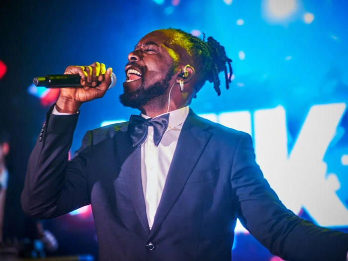 A Mikevents singer performing at an event | Mikevents
